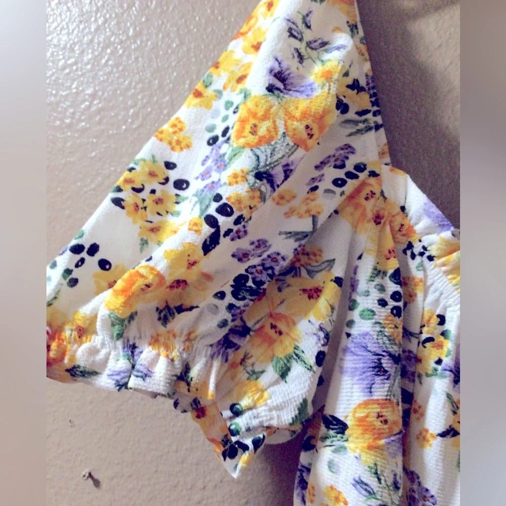 NEWT CITY CHIC PEPLUM FLORAL TOP. - Picture 10 of 11